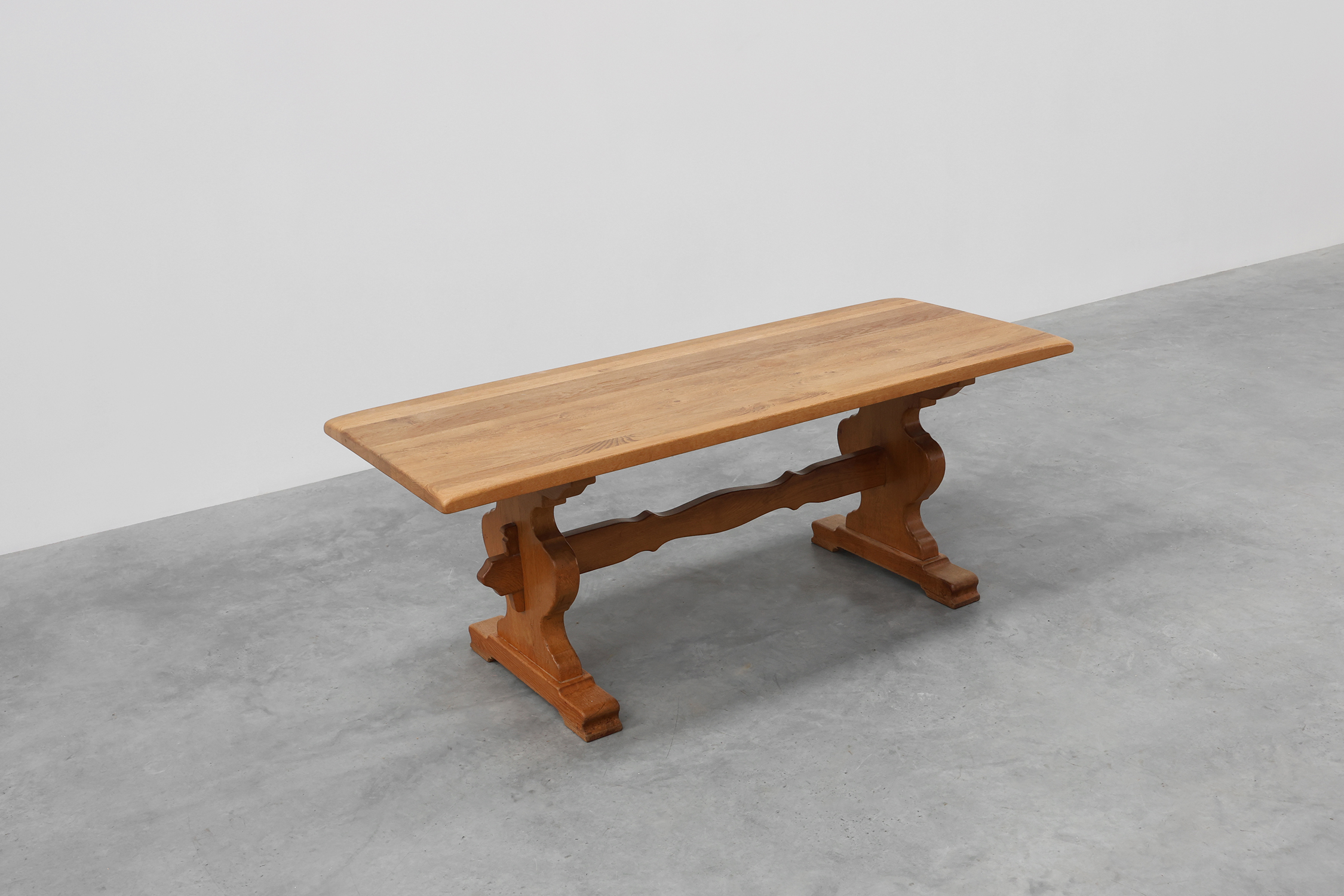 20th Century French oak trestle table with scalloped legs and plank topthumbnail